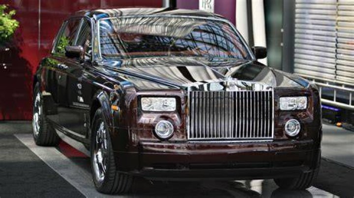 Cena with his Rolls Royce Phatom Dropdead Coupe