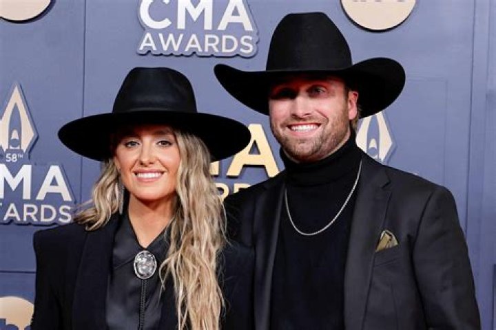 Lainey Wilson and Devlin Hodges have been going strong for over two years.