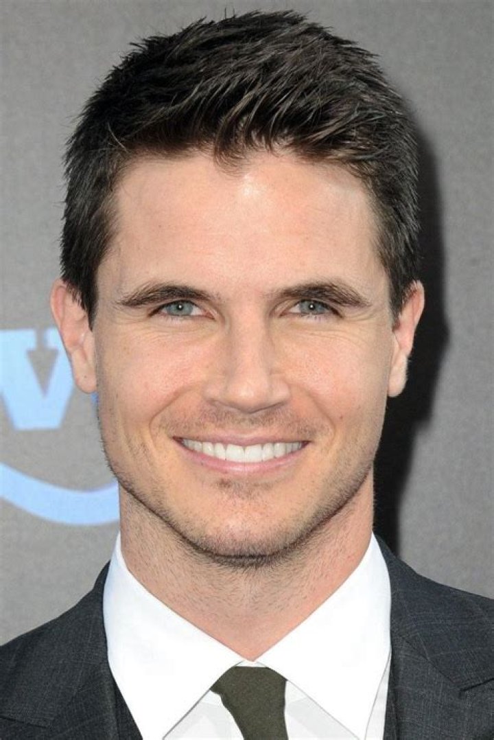 Robbie Amell's pet Shih Tzu/Poodle