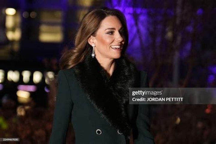 TOPSHOT - Britain's Prince Harry, Duke of Sussex (L) and Britain's Prince William, Duke of Cambridge attend the unveiling of a statue of their moth...